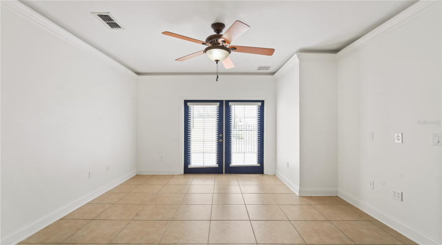 Huge main bedroom on first floor with patio entrance.