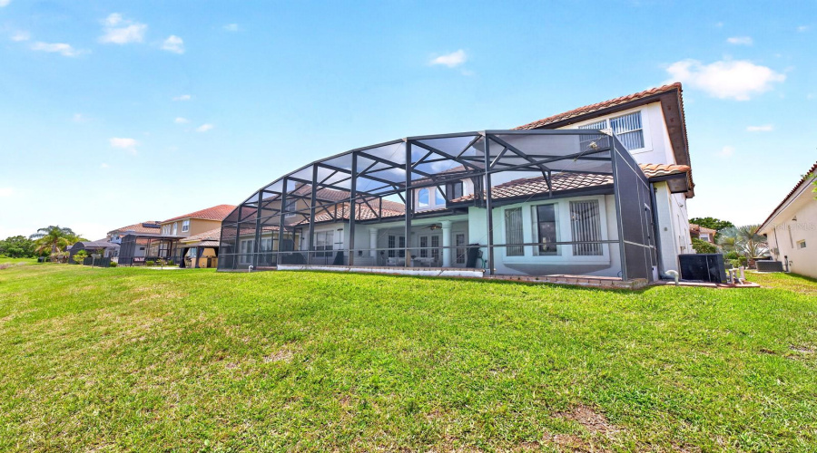 The back view of the home and spacious yard.