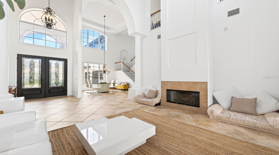 BEAUTIFUL CERAMIC TILE FLOORING flows throughout the main living areas, while CUSTOM WINDOW MOLDINGS (2020) enhance the home's refined character.