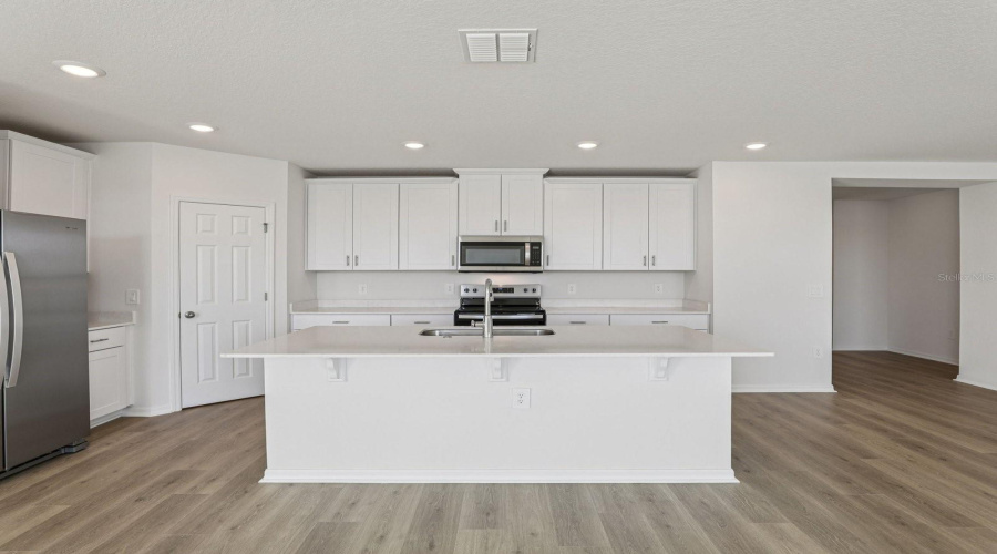 Photo is not of the actual home, but is an inspirational photo of builder’s model home and may depict options, furnishings, and/or decorator features that are not included.