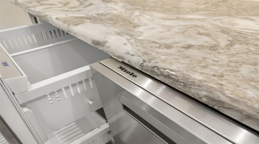 Miele Dishwasher & Sub Zero Under Counter Frdge