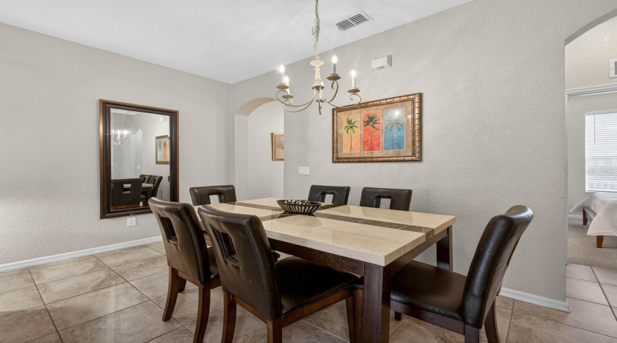 Dining area comfortably seating six.
