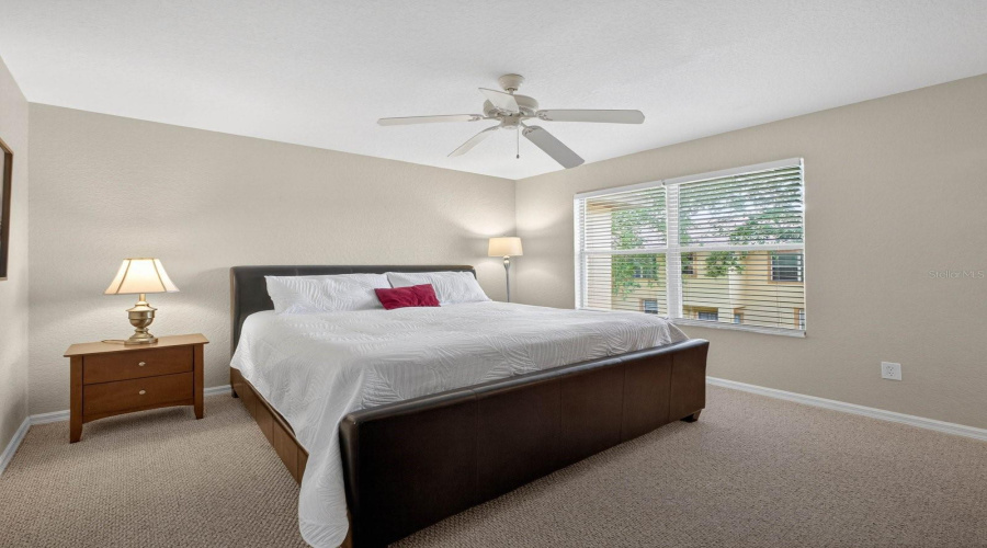 Primary bedroom featuring a king bed.