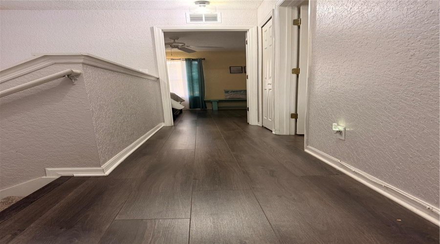 SECOND FLOOR HALLWAY LAMINATE FLOORING