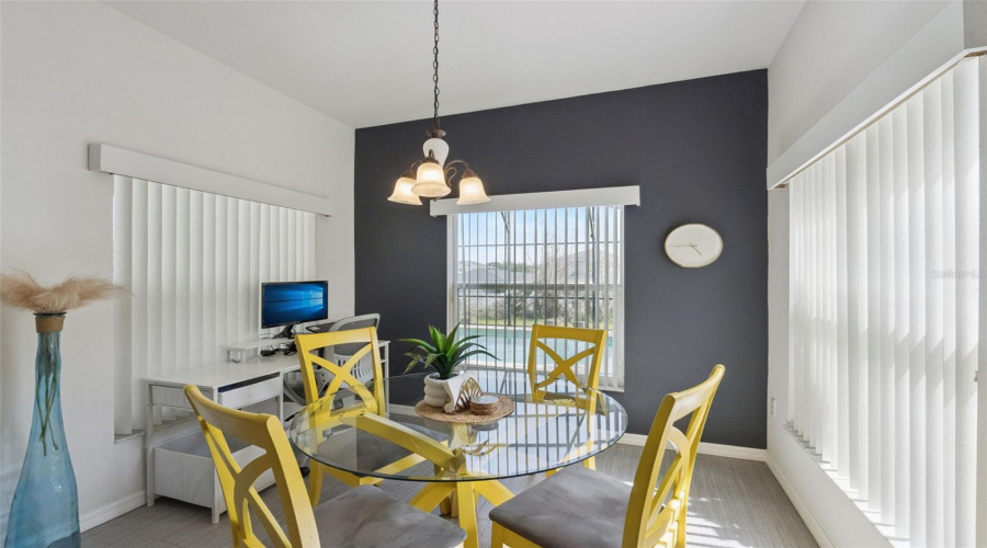 Bright breakfast nook overlooking the pool