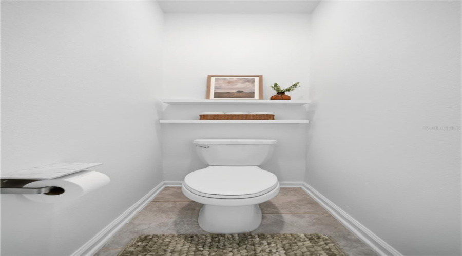Secluded toilet for primary bathroom