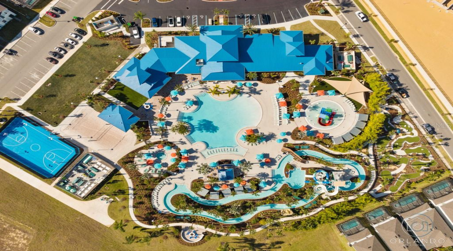 6,500-square-foot clubhouse with an expansive water park with a zero-entry pool, lazy river, double water slides, splash pad, sports courts, and on-site dining
