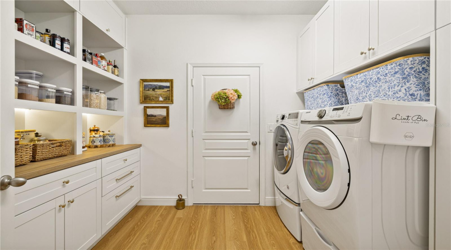 Landry room with pantry.