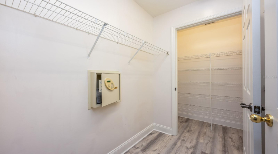 Primary extended walk-in closet.