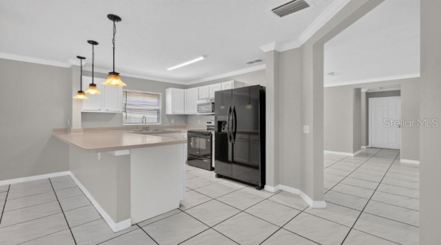 KISSIMMEE, Florida 34746, 5 Bedrooms Bedrooms, ,3 BathroomsBathrooms,Residential,For Sale,HAMLET,0,MFRO6417624