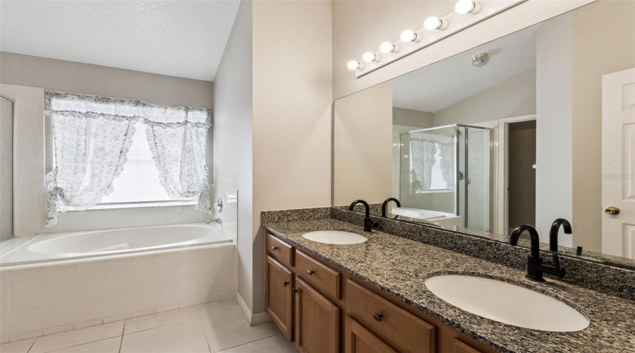 Master Bathroom w/ Double Vanity Sink and Soaking Tub