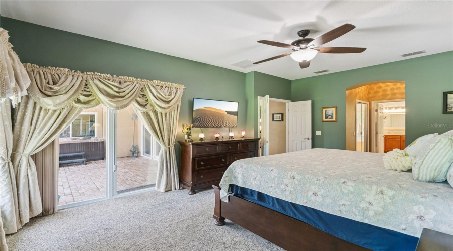 Master bedroom showing Screen doors to the Lanai