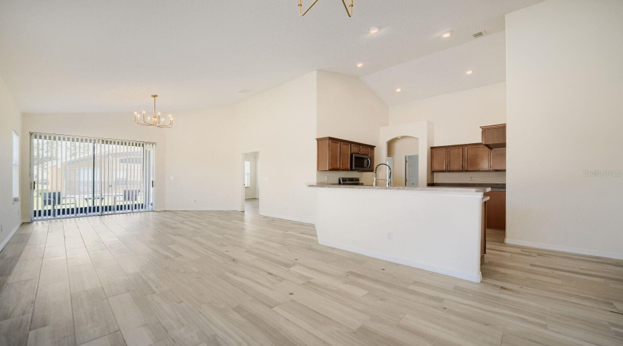 Open Floorplan with brand new wood-look flooring throughout