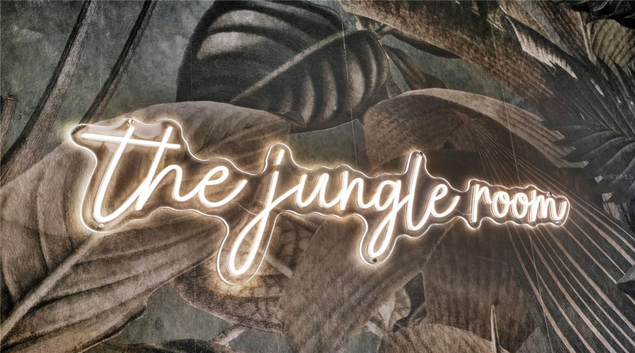 The Jungle Room blends boutique hotel style with immersive design, creating one of the home's most unique guest experiences.