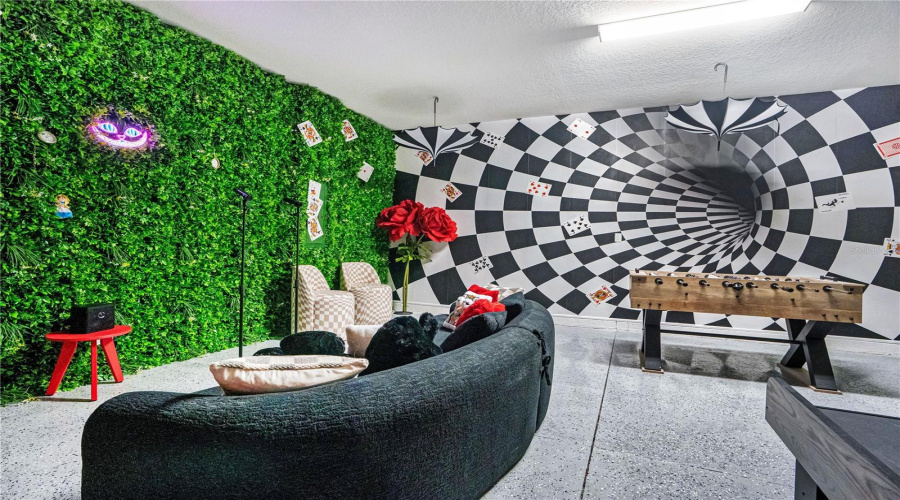 Fall Down the Rabbit Hole. The unforgettable Wonderland-inspired game room surrounds guests with whimsical décor, playful illusions, and entertainment spaces designed to delight every generation.
