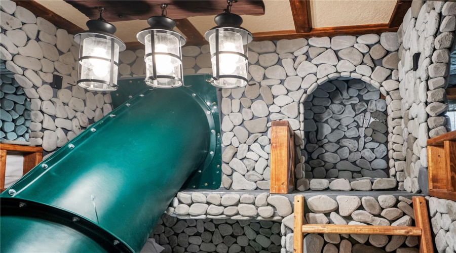 Every handcrafted element, from the castle-inspired rockwork to the adventurous slide, creates an experience guests won't soon forget.