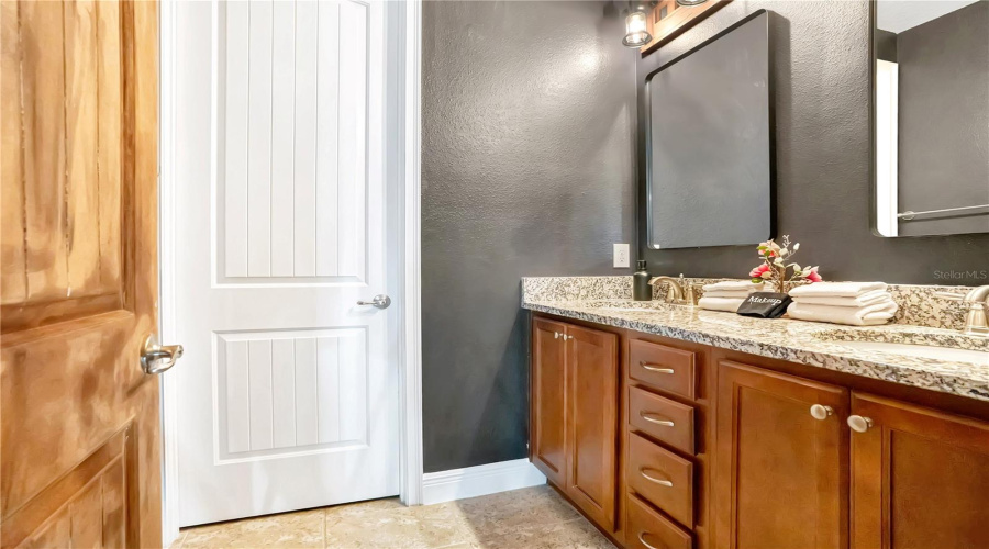 Ensuite to our dragon's training ground offers generous vanity space and modern finishes designed for comfort and convenience.