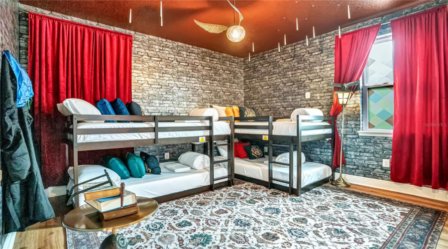 Enroll at Hogwarts. Stone-inspired walls, enchanted details, and custom bunk beds transport young witches and wizards into a magical world of imagination.