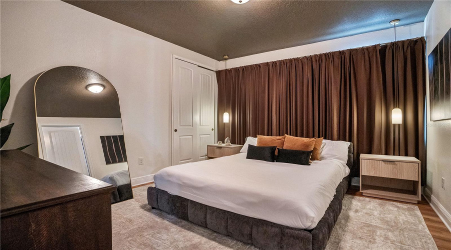 One of two spacious primary suites offers a peaceful retreat with contemporary finishes, designer furnishings, and plenty of room to unwind after a day of adventure.
