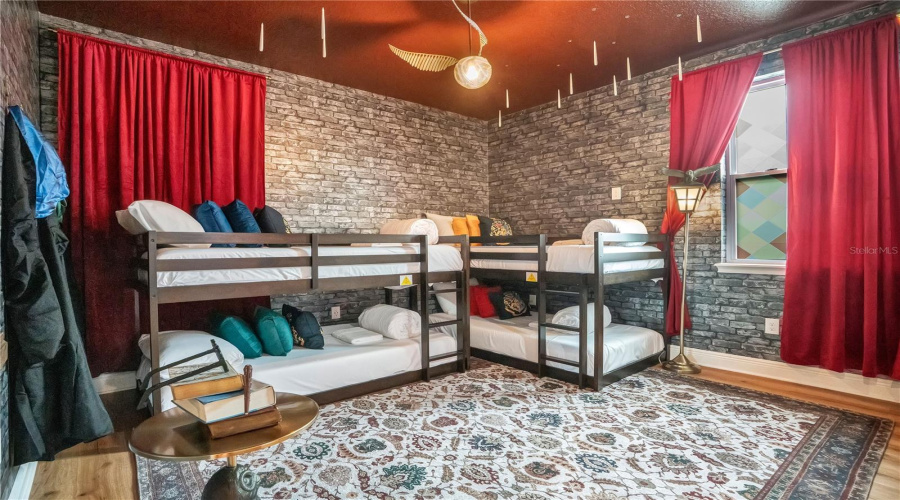 Enroll at Hogwarts. Stone-inspired walls, rich textures, custom bunk beds, and enchanting details create a magical retreat where young wizards can imagine beginning their own journey into the wizarding world.