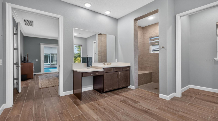 Primary suite has a luxurious bathroom