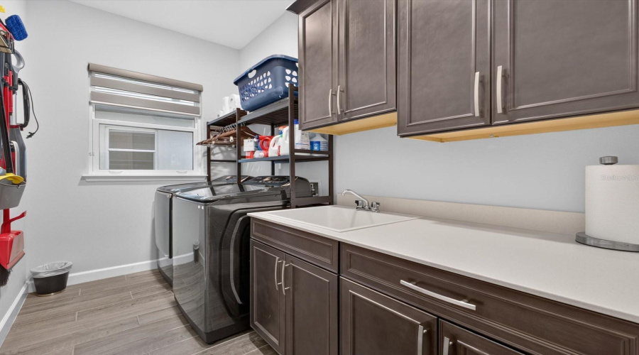 Large laundry with folding area and sink