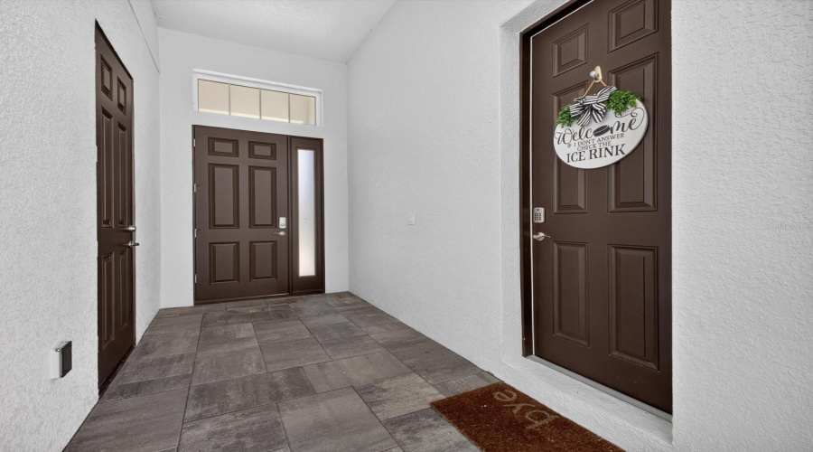 Looking to entry doorPool house entry on right