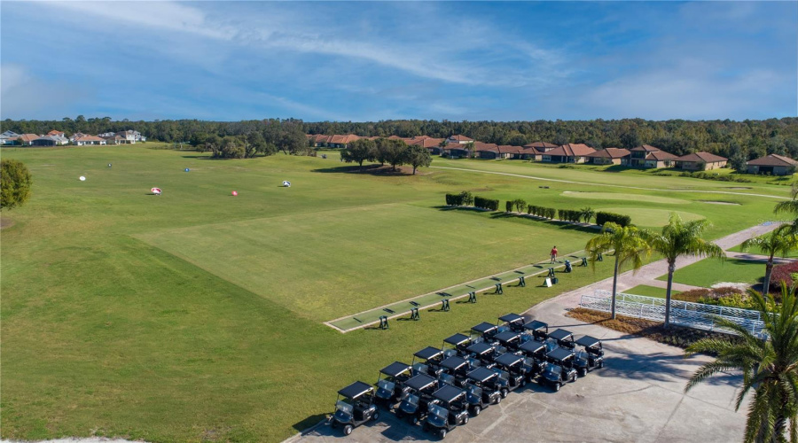 Driving range with removable shade