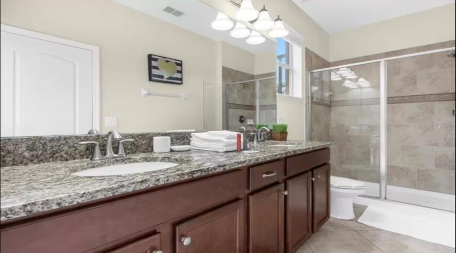 KISSIMMEE, Florida 34747, 5 Bedrooms Bedrooms, ,5 BathroomsBathrooms,Residential,For Sale,BANANA PALM,0,MFRO6412256