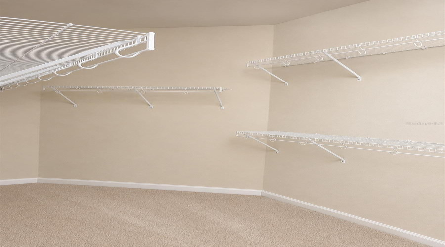 Oversized walk-in closet in primary bedroom