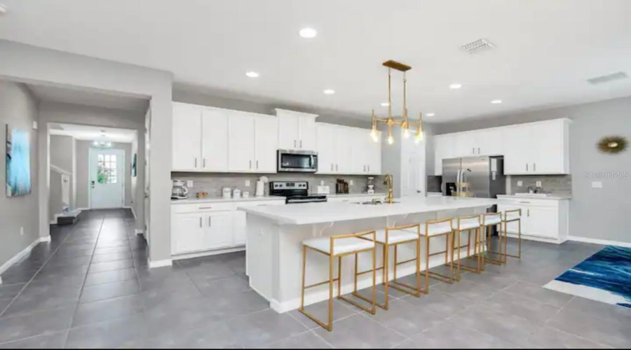 KISSIMMEE, Florida 34747, 6 Bedrooms Bedrooms, ,5 BathroomsBathrooms,Residential,For Sale,SAWYER PALM,0,MFRO6381814