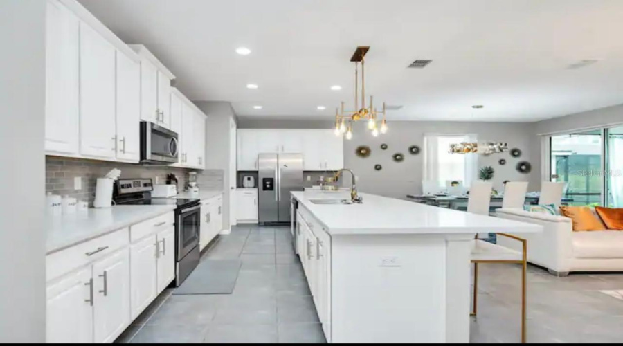 KISSIMMEE, Florida 34747, 6 Bedrooms Bedrooms, ,5 BathroomsBathrooms,Residential,For Sale,SAWYER PALM,0,MFRO6381814