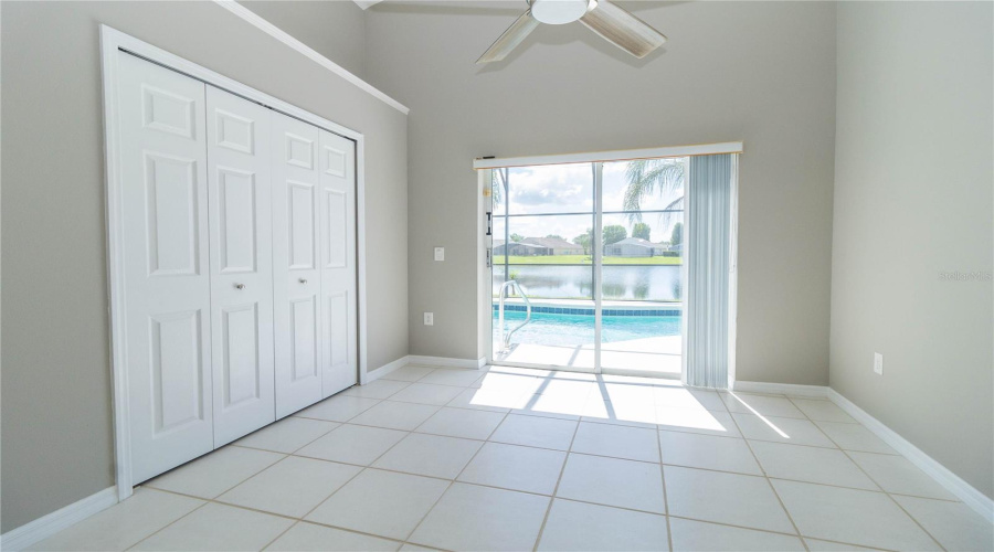 Second bedroom with pond and pool view