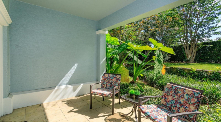Covered patio off primary bedroom