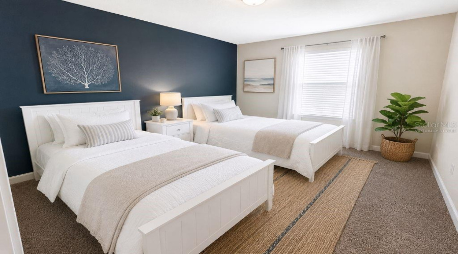 Virtually staged secondary bedroom highlighting a clean, comfortable two-bed setup with a fresh coastal-inspired feel for guests or vacation rental use.
