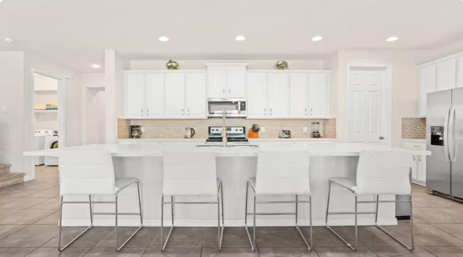 KISSIMMEE, Florida 34747, 9 Bedrooms Bedrooms, ,6 BathroomsBathrooms,Residential,For Sale,NASSAU POINT,0,MFRO6421816