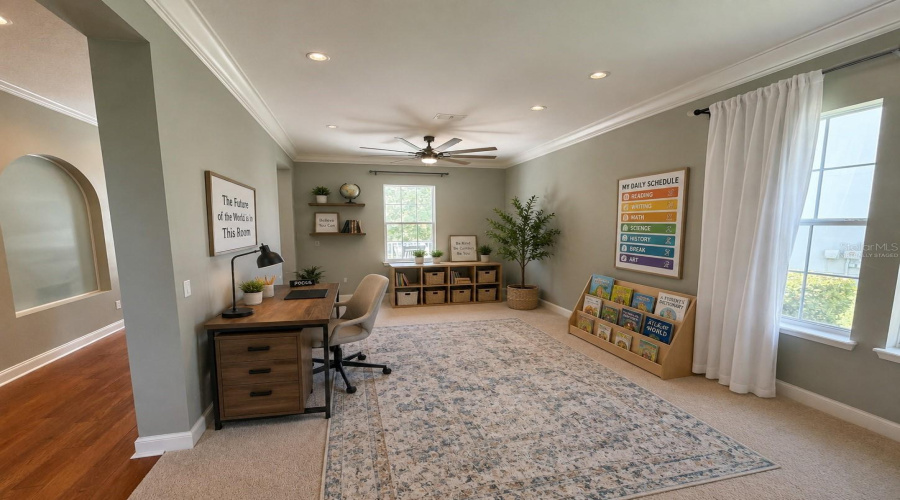Front entry room of home (Virtually staged as home school / office space)