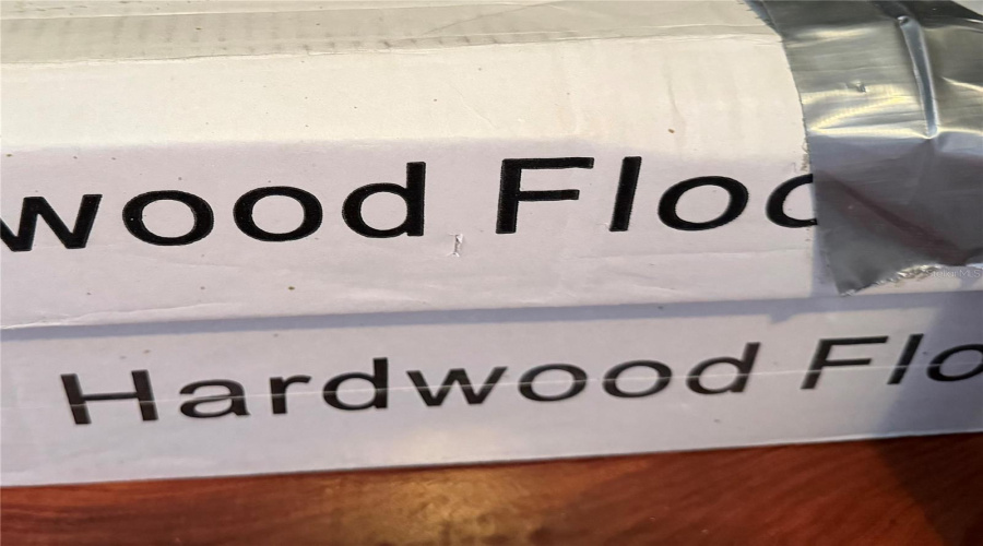 2 boxes of extra hardwood flooring