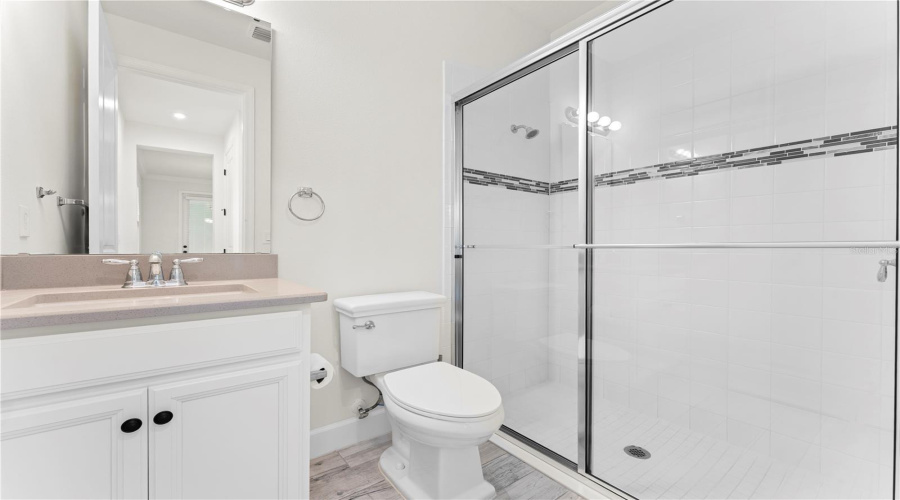 Full bath downstairs/Pool access bath