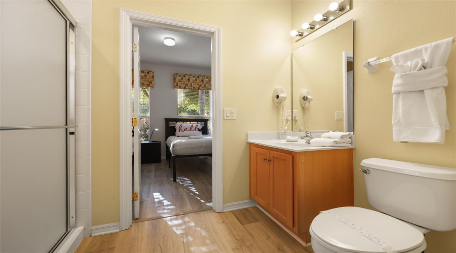 Additional view of the Jack-and-Jill bathroom highlighting the spacious layout and dual bedroom access.