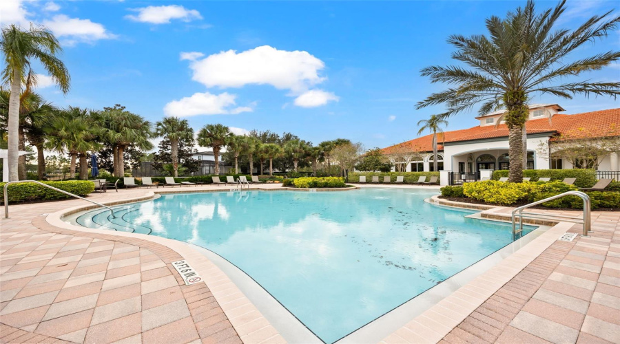 Resort swimming pool and clubhouse providing owners and guests with exceptional community amenities.