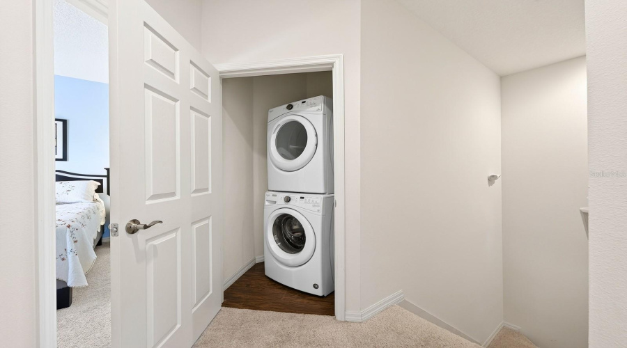 Convenient laundry closet.
