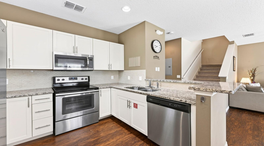 Ample cabinet and breakfast bar for casual dining.