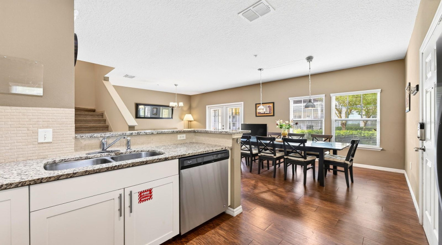 Kitchen is open to the living and dining areas.