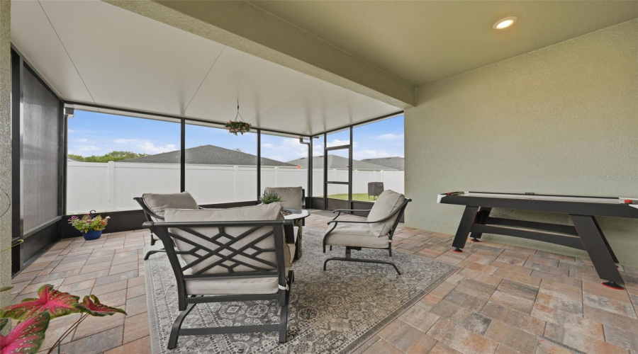 Extended Screened In Porch With Pavers