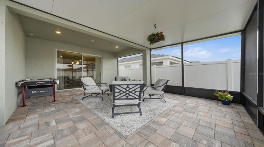 Extended Screened In Porch With Pavers