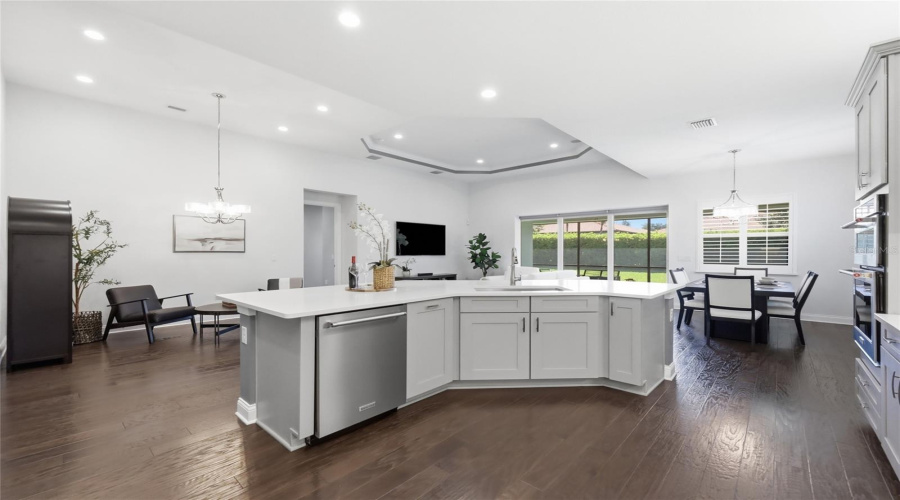 Chefs Kitchen with Quartz Counter tops, Upgraded Natural Gas Range, Upgraded Cabinets, and Oversized Island
