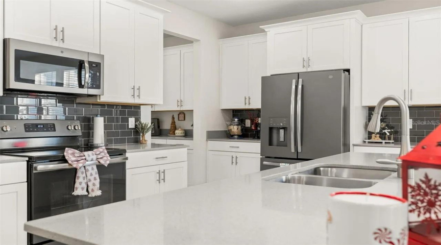 CHAMPIONS GATE, Florida 33896, 5 Bedrooms Bedrooms, ,4 BathroomsBathrooms,Residential,For Sale,OLYMPIC CLUB,0,MFRS5153434