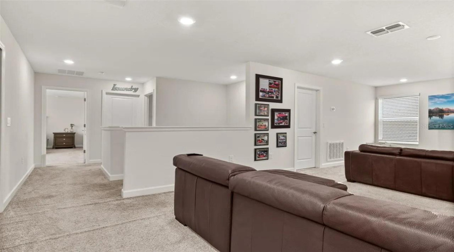CHAMPIONS GATE, Florida 33896, 5 Bedrooms Bedrooms, ,4 BathroomsBathrooms,Residential,For Sale,OLYMPIC CLUB,0,MFRS5153434