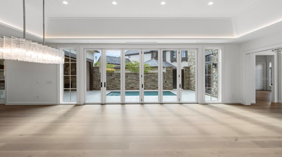 Open concept living space with dining and gourmet kitchen